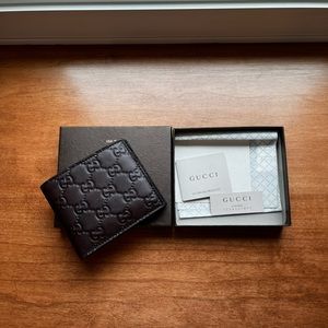 Gucci Men’s Bifold Wallet.  Never used.
